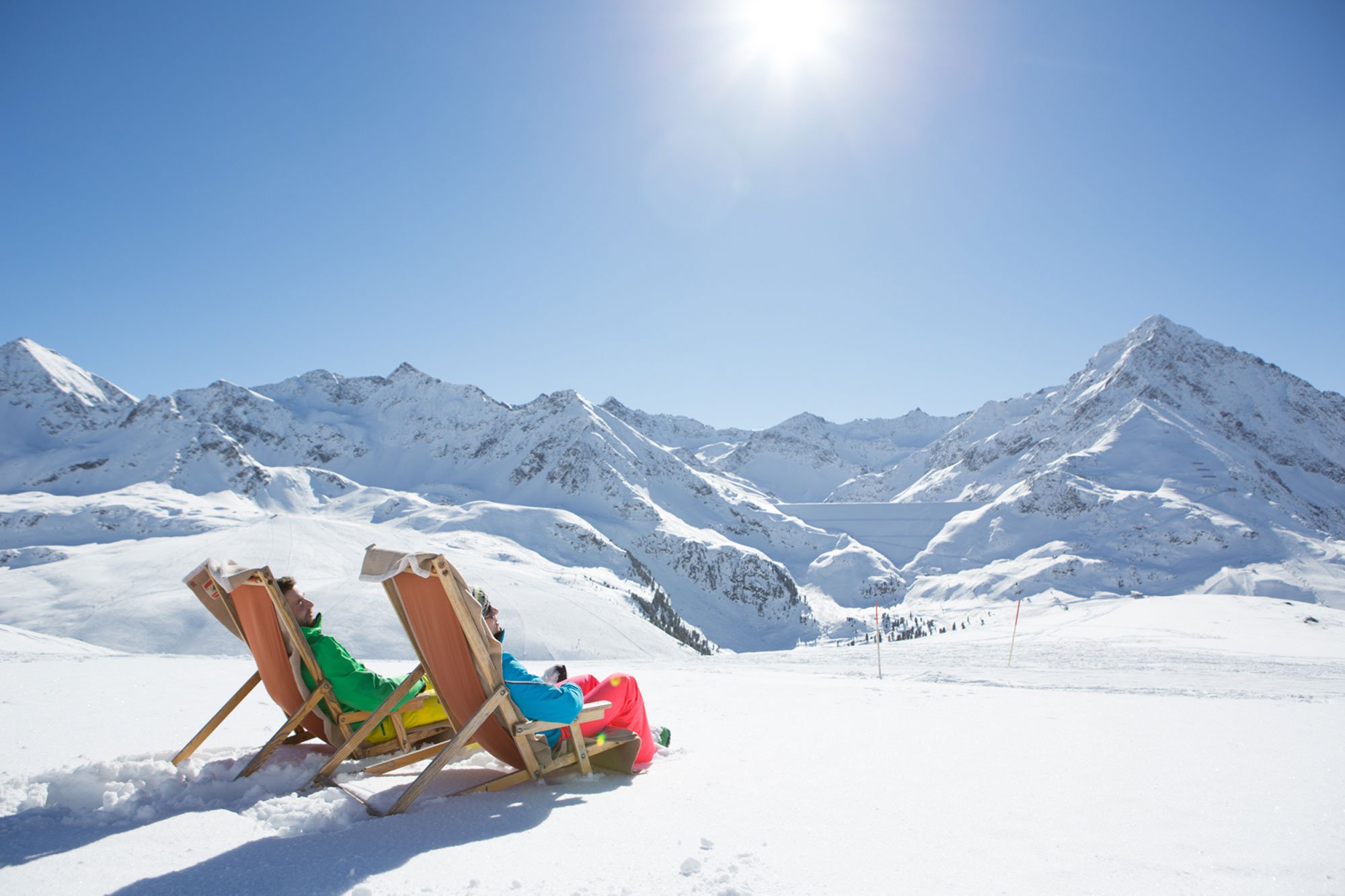 Sun bather with a great view to the greatest, snow-coverd peaks of Tyrol